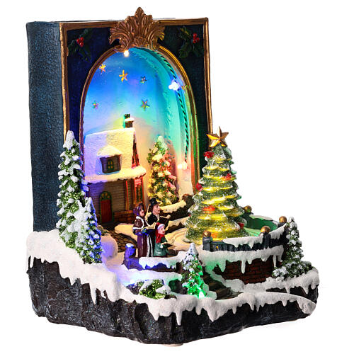 Scène Noël livre sapin mouvement 25x20x15 cm 4