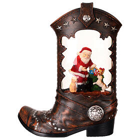 Cowboy boot with Santa Claus, snow globe with lights, music and automatic snowfall, 14x8x4 i