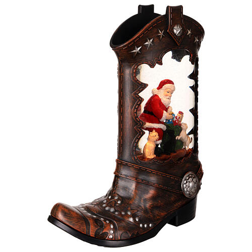 Cowboy boot with Santa Claus, snow globe with lights, music and automatic snowfall, 14x8x4 i 4