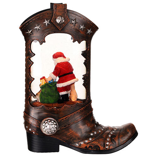 Cowboy boot with Santa Claus, snow globe with lights, music and automatic snowfall, 14x8x4 i 6