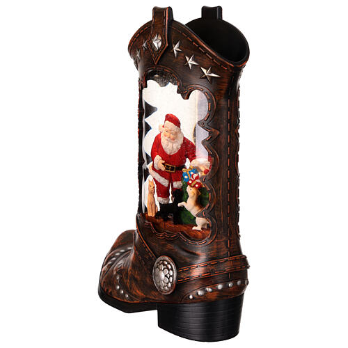 Cowboy boot with Santa Claus, snow globe with lights, music and automatic snowfall, 14x8x4 i 7