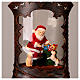 Cowboy boot with Santa Claus, snow globe with lights, music and automatic snowfall, 14x8x4 i s2