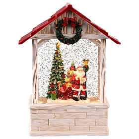 Schneekugel in Form eines Hauses, Weihnachtsmann mit Geschenksack – Musik, Beleuchtung, 28,5 × 16 × 8 cm
