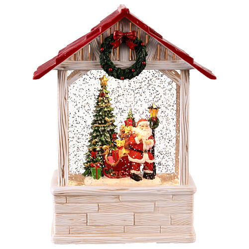 Schneekugel in Form eines Hauses, Weihnachtsmann mit Geschenksack – Musik, Beleuchtung, 28,5 × 16 × 8 cm 1