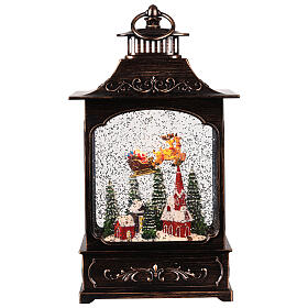 Illuminated lantern with Santa Claus on his sleigh, 8x4x12 in