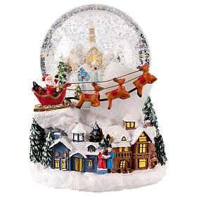 Snow globe with snowy village and Santa on his sleigh, 6x6x6 in