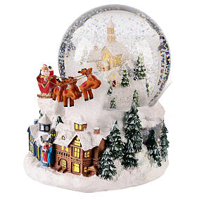 Snow globe with snowy village and Santa on his sleigh, 6x6x6 in