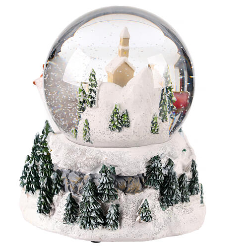 Snow globe with snowy village and Santa on his sleigh, 6x6x6 in 5