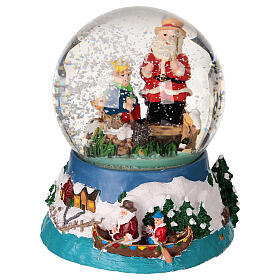 Snow globe with Santa fishing, embossed base and music box, 5x4x4 in