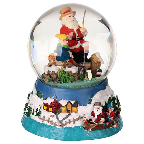 Snow globe with Santa fishing, embossed base and music box, 5x4x4 in 4