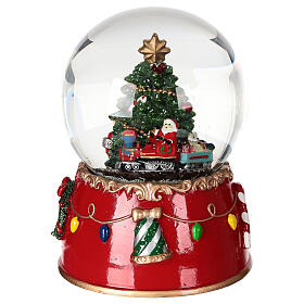 Snow globe: Santa Claus on a train with music box and motion, 6x5 in