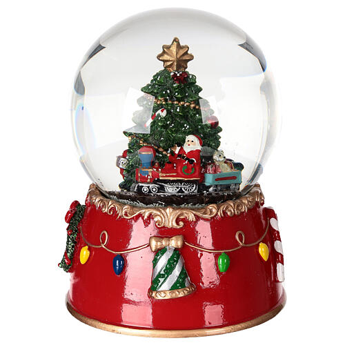 Snow globe: Santa Claus on a train with music box and motion, 6x5 in 1