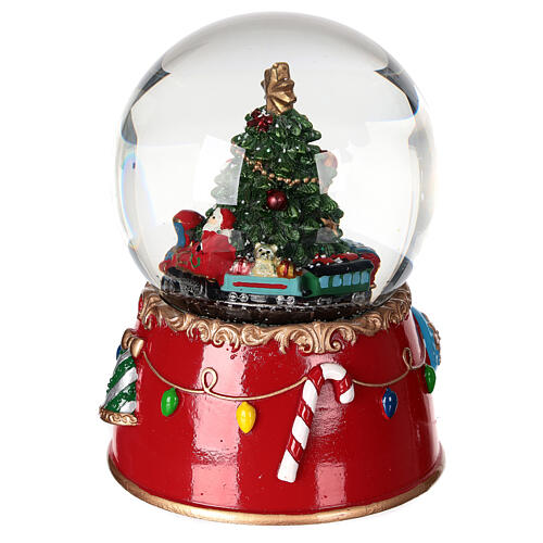 Snow globe: Santa Claus on a train with music box and motion, 6x5 in 3