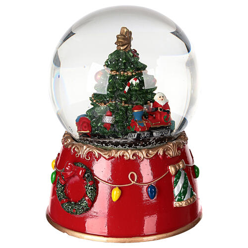 Snow globe: Santa Claus on a train with music box and motion, 6x5 in 4