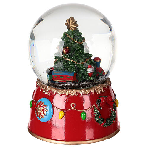 Snow globe: Santa Claus on a train with music box and motion, 6x5 in 5