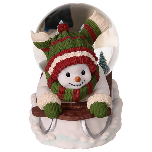 Snow globe: snowman on a sled with lights, music and automatic snowfall, 6x8x6 in 5