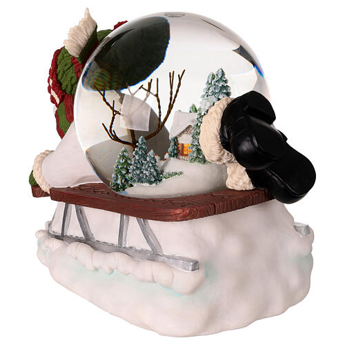 Snow globe: snowman on a sled with lights, music and automatic snowfall, 6x8x6 in 7