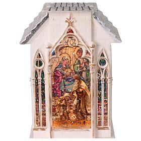 Snow globe with Nativity Scene, stained glass on a white church, lights and music, 13x4x4 in