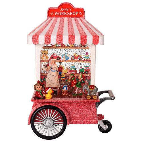 Schneekugel, Weihnachtsmanns Spielzeugwerkstatt auf Wagen – Licht, Musik, Schneewirbel, H 27,3 cm, 17,8 × 10,2 cm 1
