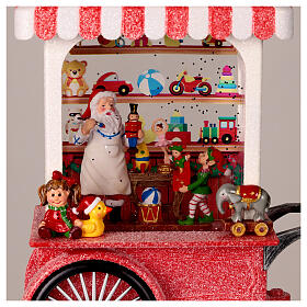 Palla neve laboratorio di Babbo Natale luci musica 25x20x10 cm