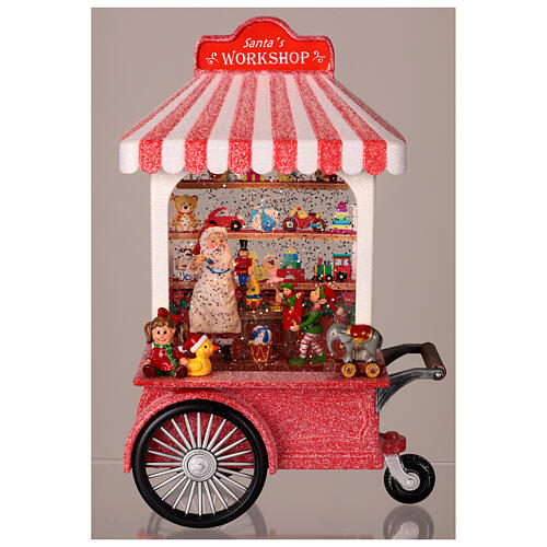 Palla neve laboratorio di Babbo Natale luci musica 25x20x10 cm 3