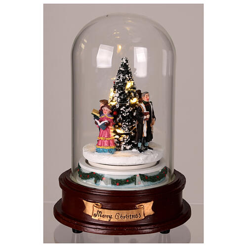 Glass dome with Christmas carolers around a tree, lights and motion, 8x6x6 in 2