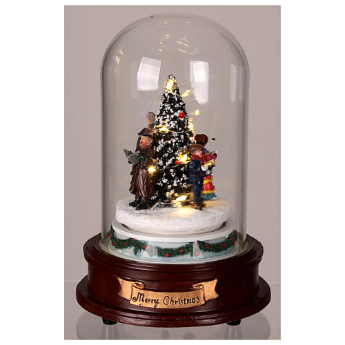 Glass dome with Christmas carolers around a tree, lights and motion, 8x6x6 in 4