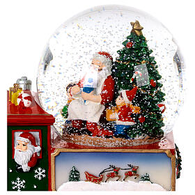 Train with snow globe, Santa Claus with child, 8x5x7 in