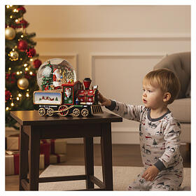 Tren con bola de nieve 12 cm Papá Noel con niño 21x12x17 cm