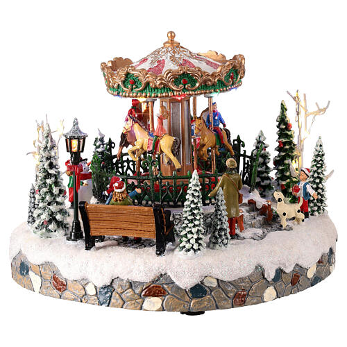 Christmas carousel with animal figures, lights and motion, 8x8x6 in 3