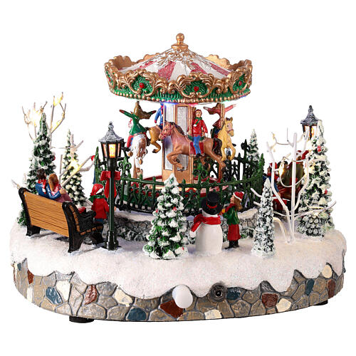 Christmas carousel with moving animals, illuminated, 20x20x15 cm 4
