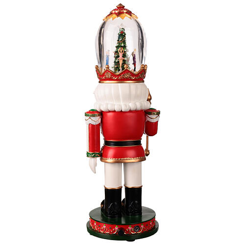 Nutcracker with illuminated Christmas tree in its glass hat, 5x5x16 in 7