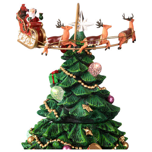 Sapin de Noël mouvement train traîneau Père Noël 25x25x45 cm 4