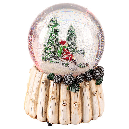 Snow globe of 4 in, children on a sled, 4x4x6 in 4