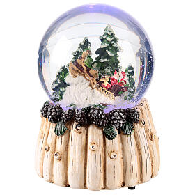 Boule à neige 100 mm Père Noël sur son traineau 10x10x15 cm