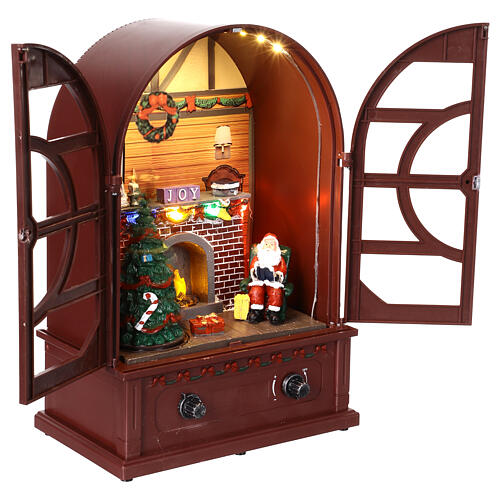 Radio vintage avec Père Noël et foyer, musique, mouvement et lumières 21x13x31 cm 3
