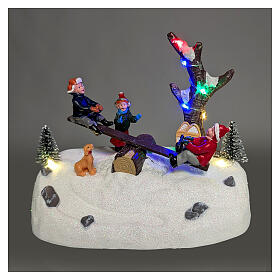 Winterszene „Wippe mit Kindern“ – beleuchtet mit Musik, 18 × 11 × 15 cm, Batteriebetrieb oder Netzadapter