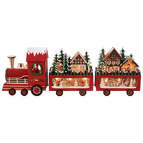 Santa Claus' train, painted wood and lights, 22x4x8 in