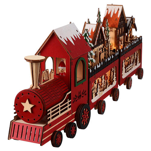 Santa Claus' train, painted wood and lights, 22x4x8 in 5