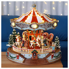 Illuminated Christmas carousel with movement and songs, 12x11x10 in