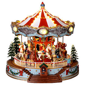 Illuminated Christmas carousel with horses and songs 30x28x26 cm
