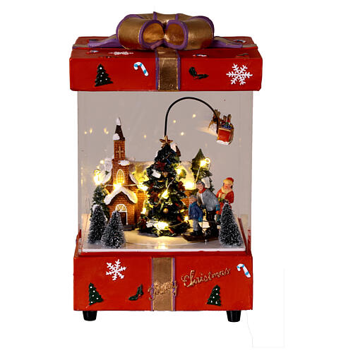 Pacco regalo rosso con chiesa slitta Babbo Natale in movimento 15x15x25 cm 1