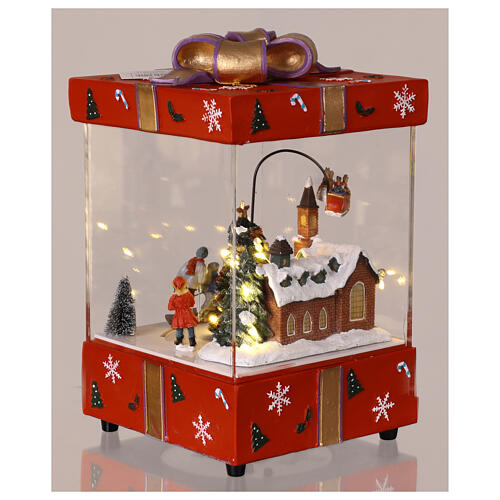 Pacco regalo rosso con chiesa slitta Babbo Natale in movimento 15x15x25 cm 4
