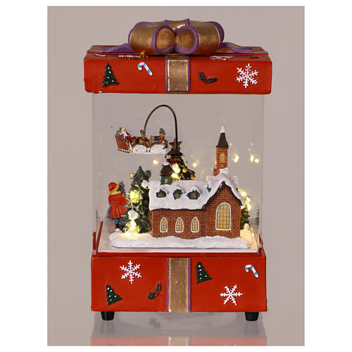 Pacco regalo rosso con chiesa slitta Babbo Natale in movimento 15x15x25 cm 5