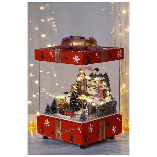 Pacco regalo con trenino in movimento illuminato con musica 15x15x25 2