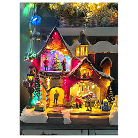 Illuminated Christmas house with music and motion, 11x6x10 in