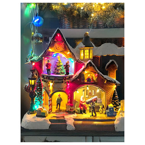 Casa Natalizia illuminata con musica e movimento 27x16x26 cm 2