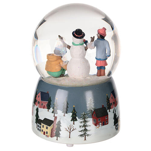 Schneekugel mit Spieluhr, Kinder bauen einen Schneemann – H 15,5 cm, Ø 10,5 cm 5