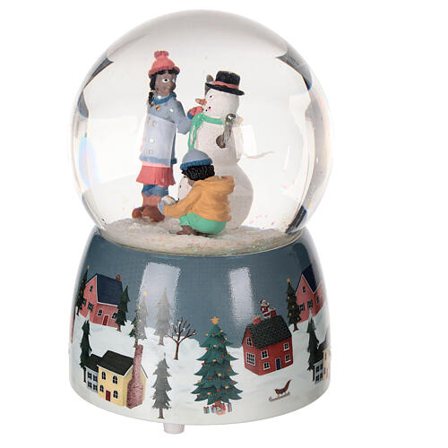 Glass snow globe: snowman and snowy landscape, glitter and music box, 6x4x4 in 3