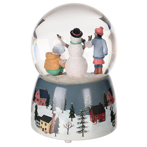 Glass snow globe: snowman and snowy landscape, glitter and music box, 6x4x4 in 5